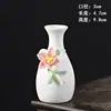 Textura de porcelana de hueso Porcelana blanca de Dehua Flores pellizcadas hechas a mano Entrada de la sala Gabinete de vinos Gabinete de TV Uso diario en el hogar Plantas verdes Arreglo floral