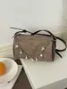 Bolso bandolera para mujer 2026 nuevo de verano moderno casual moda versátil nicho bolso de hombro para el trabajo y los desplazamientos