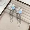 Pendientes Dorados Estilo Coreano Flor Mariposa con Borlas Largas para Mujer