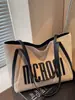 Bolsa Tote Casual para o Dia a Dia Feminina Grande Capacidade Outono 2025 Novo Estilo Ombro Único Bolsa de Compras Bolsa para Aula de Estudante Universitário