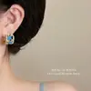 Pendientes Azules Estilo Francés con Esmalte de Goteo e Incrustaciones de Flores Azules, Diseño de Nicho, Accesorios de Gama Alta Estilo Vintage