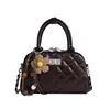 Bolso de mano rombos cruzados para mujer 2026 nuevo estilo versión coreana bolso bowling estilo pequeño Chanel cadena bandolera de un solo hombro