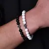 Pulseira Cruz Pedras Negras de Vesícula Biliar Transfronteiriça Conjunto de Casal Preto e Branco Fosco Pulseira com Fio Elástico Fábrica Atacadista