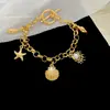Pulsera Colgante de Concha y Estrella de Mar Transfronteriza Europea y Americana, Lujo Ligero, Moda de Alta Gama, Diseño de Pulsera Personalizado, Joyería de Mano de Nicho