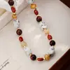 Pulsera de Perlas Estilo Vintage Nala Piedra de Tigre Roja Piedra Natural Cadena para Suéter Lujo Ligero Gama Alta Collar Otoño e Invierno para Mujeres