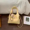 Bolsas Pequeñas de Temporada Primavera-Verano Más Vendidas para Mujer 2026 Nuevo Moda Versátil Bolso Cruzado Bolso de Mano Exquisito Super Popular Bolso Cubo