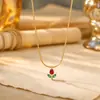 Moderna e luxuosa, esta colorida corrente de aço titânio com tulipas de diamante é uma peça delicada e única com um estilo doce e charmoso.. É um novo design floral que complementa qualquer look e é perfeito como uma corrente para a clavícula.
