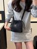Textura de Moda Casual Nylon Cordón Mensajero Bolso Pequeño 2025 Casual Viajero Bolso de Hombro Moda Viaje Bolso Tipo Cubo