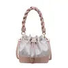 Bolso bandolera tipo cubo para mujer 2026 verano nuevo de alta gama lujo ligero moda nicho bolso de hombro trabajo bolso tote pequeño