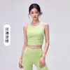 Top de yoga para mujer con cintura plisada, copas fijas que se mantienen en su lugar, elegante diseño de bloques de color y espalda cruzada