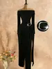 M26D742 Vestido bodycon sexy de cuello alto, manga larga, abertura alta, corte ajustado, lanzamiento temprano de otoño europeo y americano para mujer