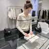 Cárdigan de punto a rayas de alta gama con cuello polo para mujer, nueva camisa de manga larga de otoño, elegante y a la moda, que rejuvenece, top estilo para ir al trabajo