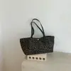 Shuai Mi Jia retro nicho 2026 modelo nuevo simple casual moda bolsa de mano para ir al trabajo bolsa de hombro de gran capacidad