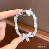 Adecuado para correas de reloj inteligente Little Genius Z12/Z11/Z7S/Z9/Z10 Pulsera magnética tejida Corazón de Ángel