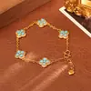 Pendientes de trébol de cuatro hojas turquesa azul de moda con circonita cúbica, una pulsera delicada y fresca con temática de bosque, y un collar elegante y de alta gama con un aire juvenil.