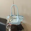 Bolso de Cesta de Verduras Amarillo de Gama Alta para Mujer 2026 Nuevo Ligero Lujo Nicho Bolso de Mano de Gama Alta para el Trabajo Bolso Cruzado