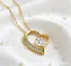 Joyería Popular Transfronteriza Estilo Europeo y Americano Collar con Forma de Corazón Incrustado de Diamantes Cadena de Clavícula de Acero Inoxidable de Moda para Mujeres