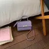 Bolso Pequeño Cuadrado Portátil Transfronterizo para Mujer 2026 Modelo Nuevo Bolso de Hombro de Moda de Lujo Ligero de Nicho Bolso Cruzado para Viajero