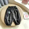 Nuevos estilos de primavera y otoño para exportación: Pantalones deportivos para niños, pantalones casuales y pantalones de chándal, adecuados tanto para niños como para niñas, de estilo coreano, diseñados para uso en exteriores