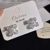 Pendientes de botón de flor de circonita francesa Moda Retro Lujo Ligero Nicho Versátiles Tridimensionales Exquisitos de Alta Gama Adornos para Orejas para Mujer