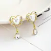 Pendientes de Amor de Perla Retro Franceses Simples Transfronterizos Lujo Ligero Nicho Elegante Diseño de Alta Gama Pendientes Colgantes de Gota de Agua