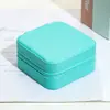 Diseño de color macarrón estilo ins simple cremallera dura PU bolsa de almacenamiento de joyas color sólido exportación transfronteriza exclusiva