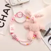 Otoño e Invierno Peluche Conejo Color Contrastante Perlas Cámara CCD Correa Accesorios Funda de Teléfono Móvil Colgante Pulsera Antiperdida Polaroid