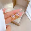 [Ouro Real] Brincos geométricos de diamante com pingente de franja longa feminina, brincos estilo lady, brincos de personalidade atacado