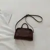 Bolsa Tote Boston Estilo Relajado para el Viaje Diario Mujer 2026 Nueva Elegante Color Sólido Moda Bolso de Hombro Cruzado de Alto Valor