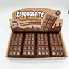 Brinquedo squishy em formato de chocolate em estoque para alívio do estresse, textura macia e espremível, brinquedo squishy grande com tema de comida, recuperação lenta