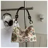 Bolsa de Tela Bordada Versátil de Moda Nueva Primavera 2026 Transfronteriza para Mujer, Bolso Tote Elegante de Hombro o Debajo del Brazo Estilo Nicho