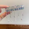 2026 Nuevo Modelo Nuevo Estilo Chino Campana Plateada Oscilante Estilo Étnico Mongol Pinza para el Cabello de Circonita con Acabado de Alta Gama y Borla Accesorio Lateral para el Cabello