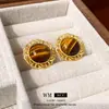 Brincos de Prata com Pedra Olho de Tigre Marrom Maillard Retrô Nicho Tarraxas Leve Luxo Alto Padrão Brincos Elegantes para Mulheres Atacado