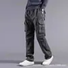 Venta al por mayor de pantalones cargo deportivos para hombre de primavera y otoño, pantalones largos casuales con bolsillos, pantalones de pierna recta modernos y cómodos para plataformas de comercio electrónico independientes
