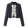 Ropa europea y americana para mujer transfronteriza, moda casual de venta caliente en AliExpress, chaqueta corta de retazos de encaje + pantalones cortos casuales tipo botón