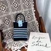 Bolso pequeño portátil de verano 2024, nuevo y popular bolso cruzado de punto para teléfono móvil.