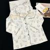 Pijamas de fábrica en stock transfronterizos para mujer primavera manga larga pantalones pijama de seda de hielo para exterior seda de imitación comercio exterior ropa para el hogar al por mayor