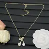 2025 Nuevo Modelo Huajia Versión de Alta Gama Pendientes en Forma de V con Diamantes Rojos Cereza para Mujer, Collar de Lazo de Lujo al por Mayor