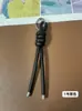 Llavero de cordón de cuero PU transfronterizo, colgante versátil para bolso, accesorios de decoración para botellas de agua y muñecas DIY, llaveros al por mayor