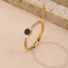 Pulsera de acero de titanio de moda simple europea y americana con diseño clásico de círculo de diamantes y números romanos