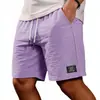 2026 Amazon Nuevos Pantalones Cortos Bermuda Casuales de Color Sólido Ajuste Holgado para Hombre de Algodón y Lino con Cordón Pantalones Cortos de Playa