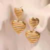 Moda Transfronteriza Europea y Americana Temperamento Pendientes de Acero Inoxidable en Forma de Corazón Pendientes de Diamantes de Lujo Ligero Femeninos Pendientes al por Mayor