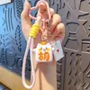 Llavero original de resina de mahjong con mascota linda para mujer, accesorio para teléfono y bolso, adorable llavero de mahjong de dibujos animados para llaves de coche