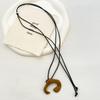 Collar de Cadena de Suéter Transfronterizo Europeo y Americano Joyería de Otoño e Invierno para Mujer Halter Bolso de Cuero Peine Colgante de Corazón Croissant