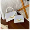 Bolso minimalista de moda transfronterizo para madre e hija, bolso de caja de dulces de nicho, bolso de mano de alta calidad, bolso versátil de hombro y cruzado