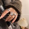 Anillo de mariposa estilo Chanel con textura de metal gris perla, combina con todo, personalidad de moda femenina, anillo retro exagerado apilado.