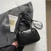 Bolsa Transfronteiriça 2026 Novo Design de Nicho Padrão Lichia Estilosa Versátil Simples para o Dia a Dia Transversal Feminina