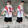 Conjunto de Verano para Niños 2026 Nuevo Estilo Deportivo de Manga Corta Shorts Conjunto de Dos Piezas para Niños Mayores Streetwear Moderno y Elegante Ropa Infantil