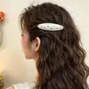Pinza para el pelo ovalada de lunares estilo coreano, simple y versátil, pinza de cocodrilo estilo girly, accesorio para el pelo al por mayor, pinzas blancas y negras al por mayor