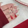 Brincos de ano festivo estilo chinês com agulha de prata, brincos assimétricos de leão com amor vermelho e oco da fortuna